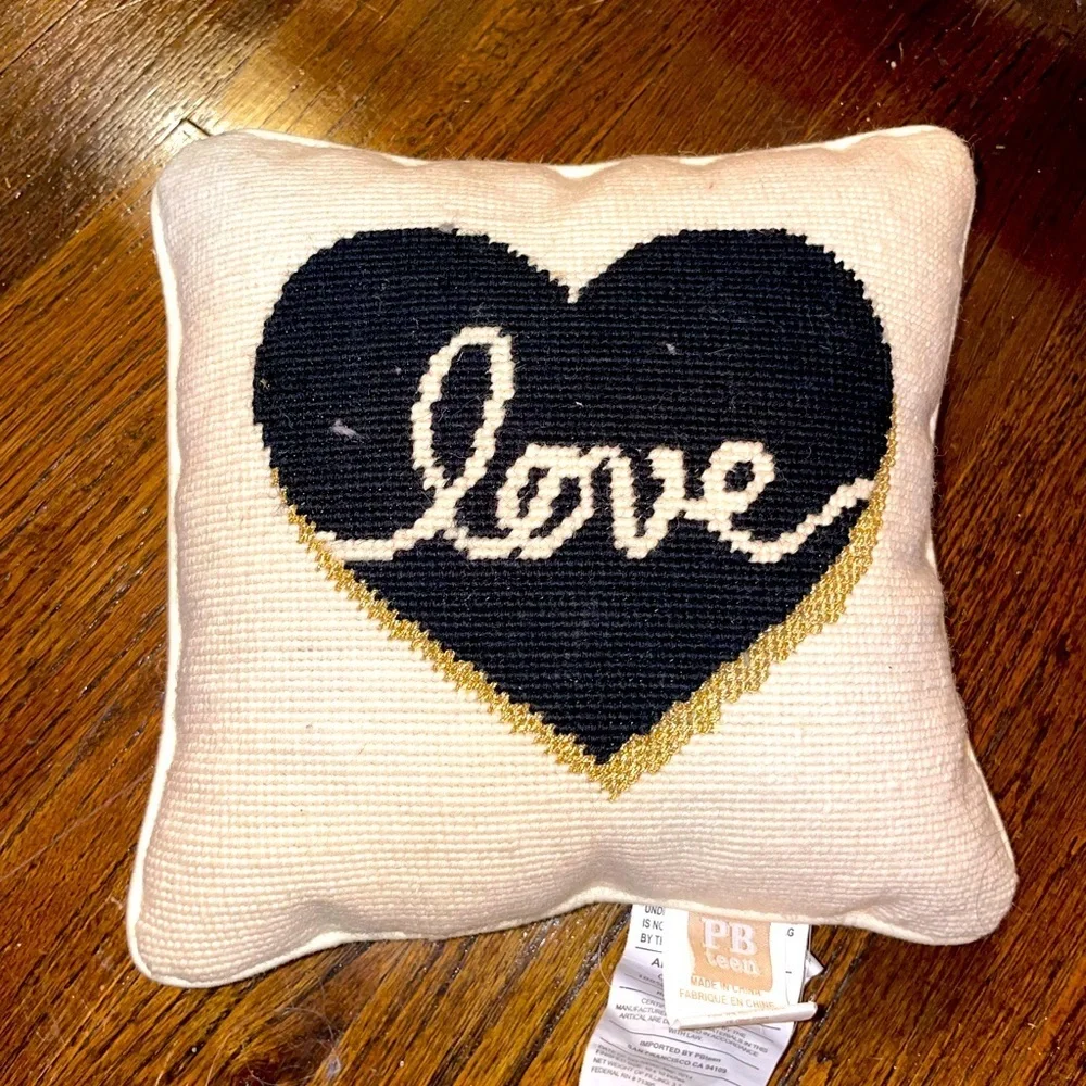 Pottery barn love pillow designed by Emily and Merritt🖤🤍💛